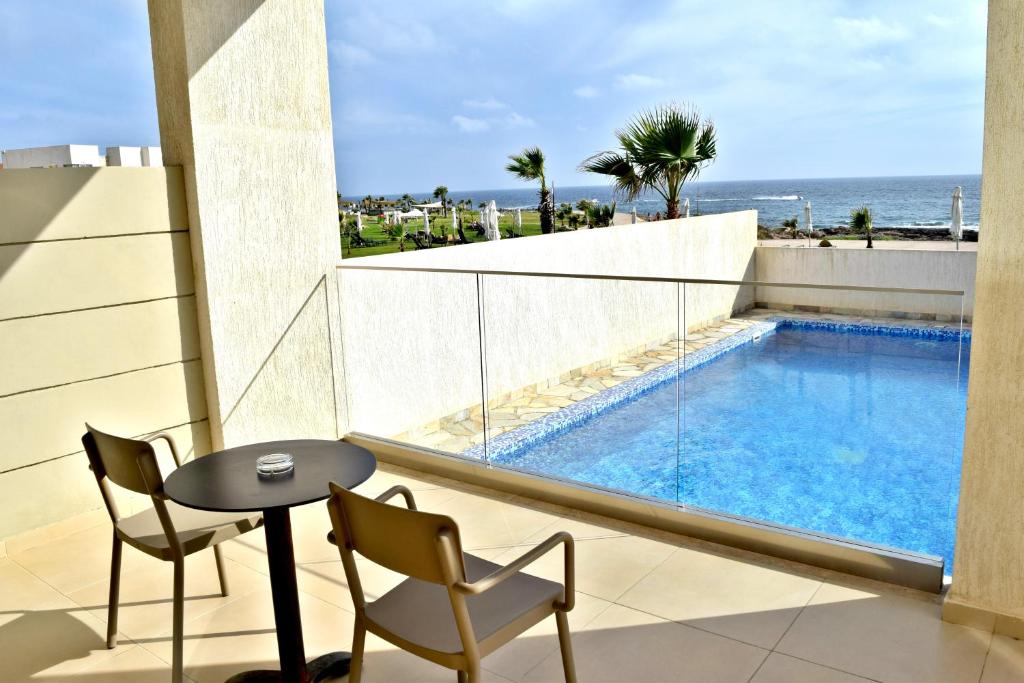 Amphora Hotel and Suites, Кипр, Пафос, туры, фото и отзывы