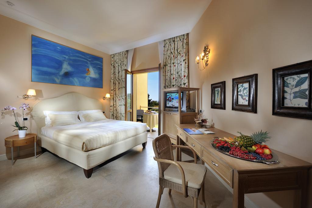 Tombolo Talasso Resort Италия цены