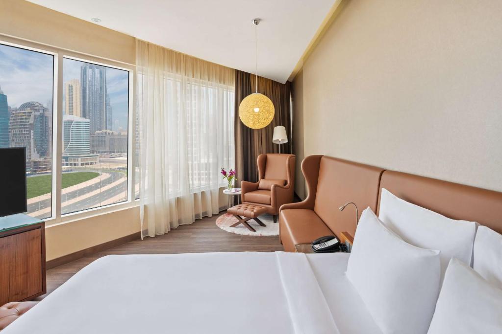 Готель, Radisson Blu Hotel, Dubai Canal View