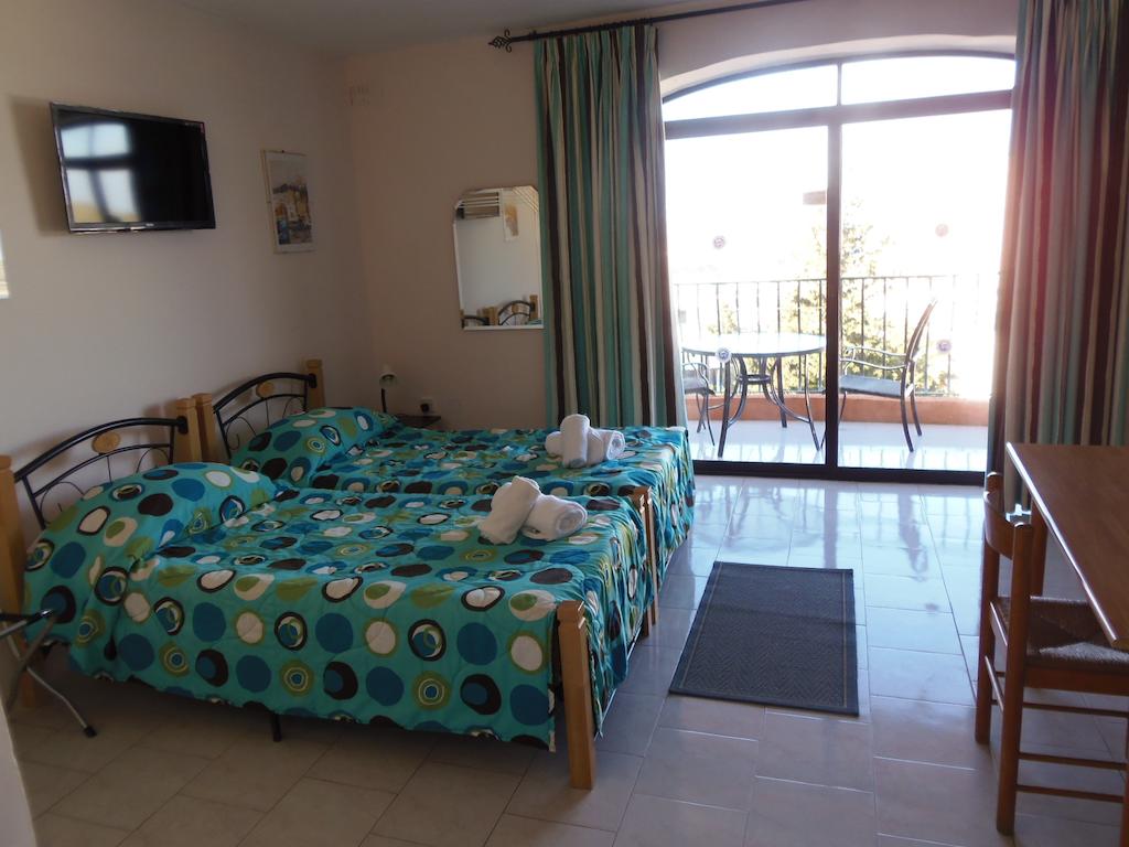 Отдых в отеле White Dolphin Holiday Complex Аура Мальта