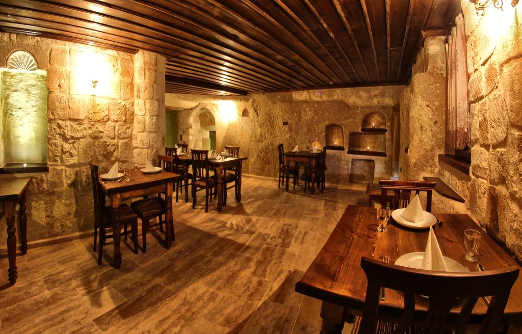 Відпочинок в готелі Kemerhan Cave Suites Ургюп Туреччина