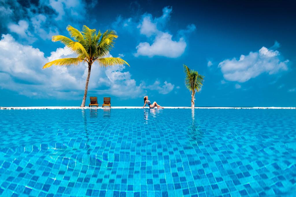 Отдых в отеле South Palm Resort Maldives Адду Атолл