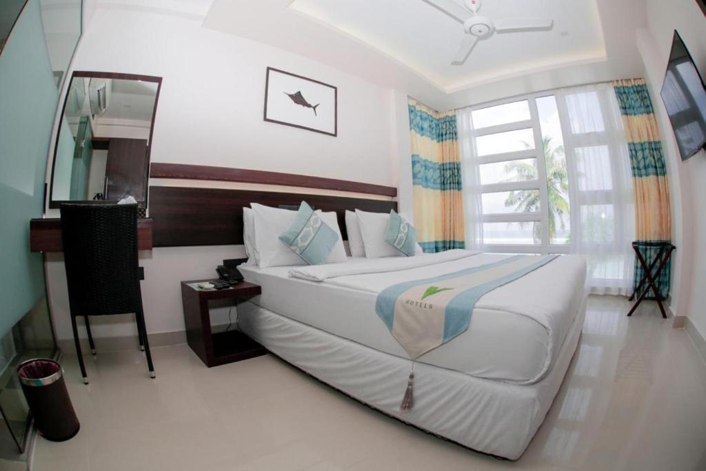 Горящие туры в отель White Harp Beach Хулхумале Мальдивы