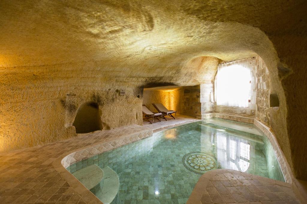 Отдых в отеле Kayakapi Premium Caves Cappadocia Ургюп Турция