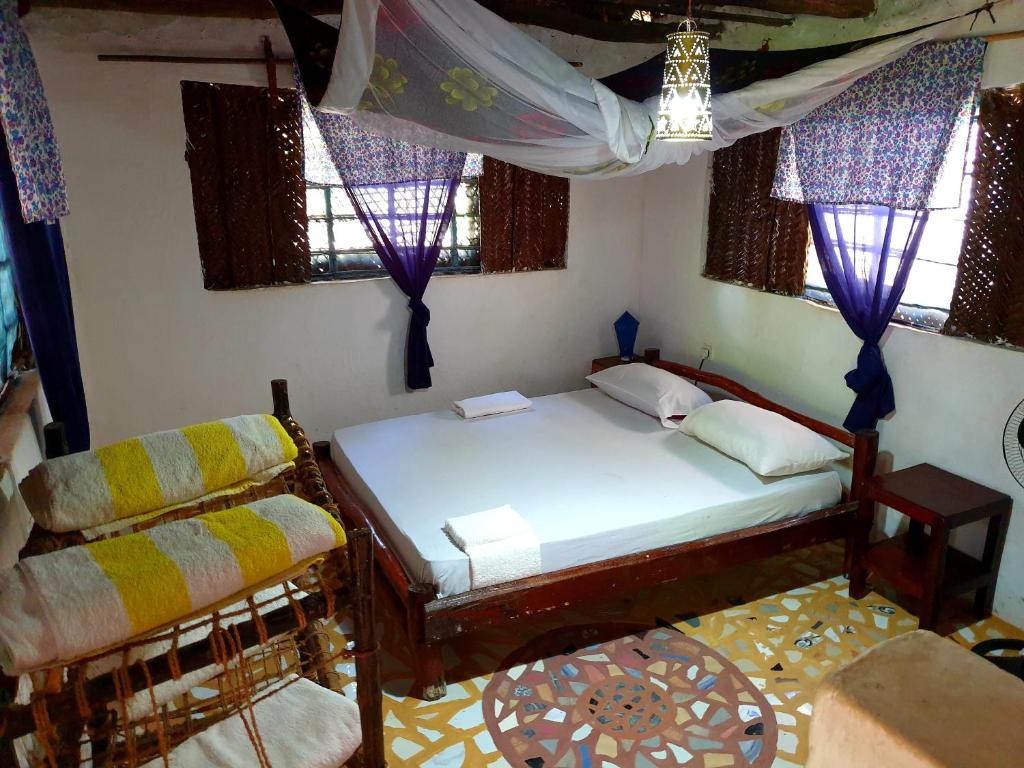 Горящие туры в отель Fontaine Garden Village Бведжуу Танзания