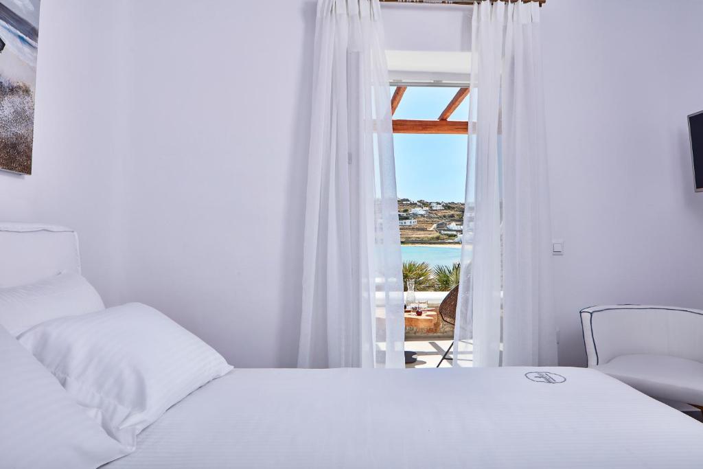 Отдых в отеле Mykonos Waves Beach House & Suites