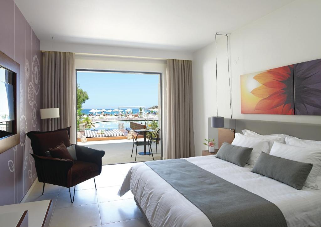 Atlantica Kalliston Resort & Spa (ex. Grecotel Kalliston Hotel) Греція ціни
