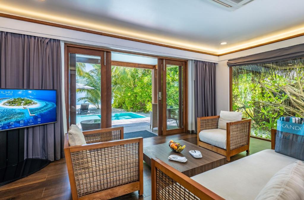 Kandolhu Island Resort, Malediwy, Atole Ari i Rasdhoo, wakacje, zdjęcia i recenzje