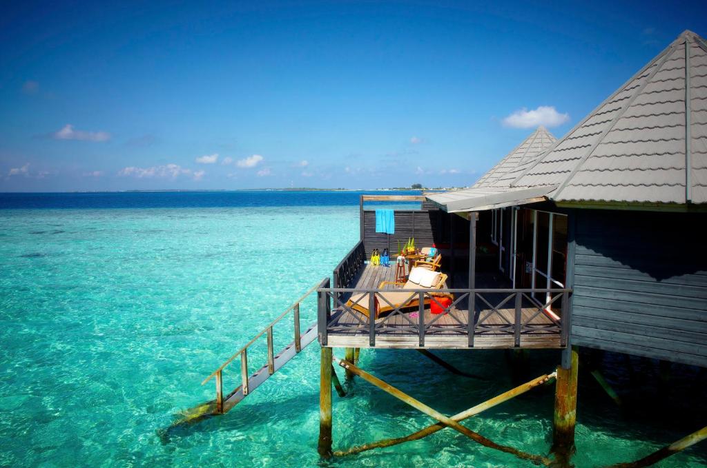 Отдых в отеле Komandoo Island Resort Лавиани Атолл Мальдивы