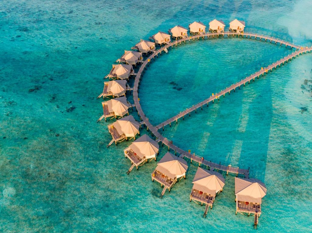 Komandoo Island Resort, Мальдіви, Лавіані Атол, тури, фото та відгуки