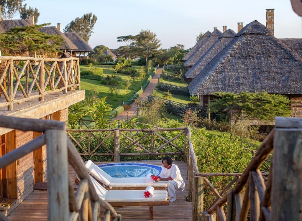 Neptune Ngorongoro Luxury Lodge, Кратер Нгоронгоро, Танзания, фотографии туров