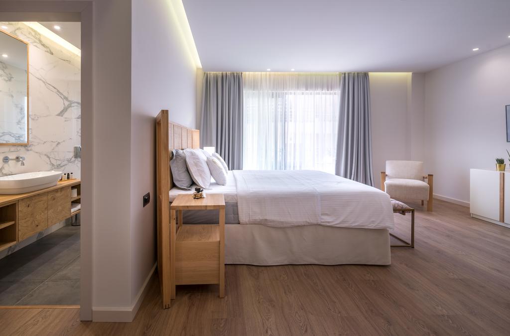 Glow Boutique Hotel and Suites цена