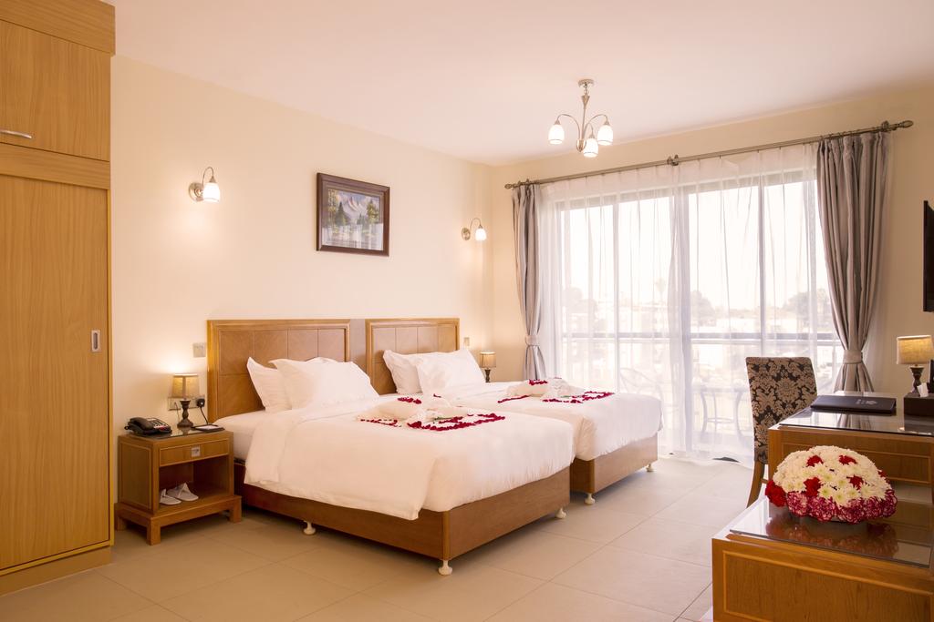 Lotos Inn & Suites, Найроби цены
