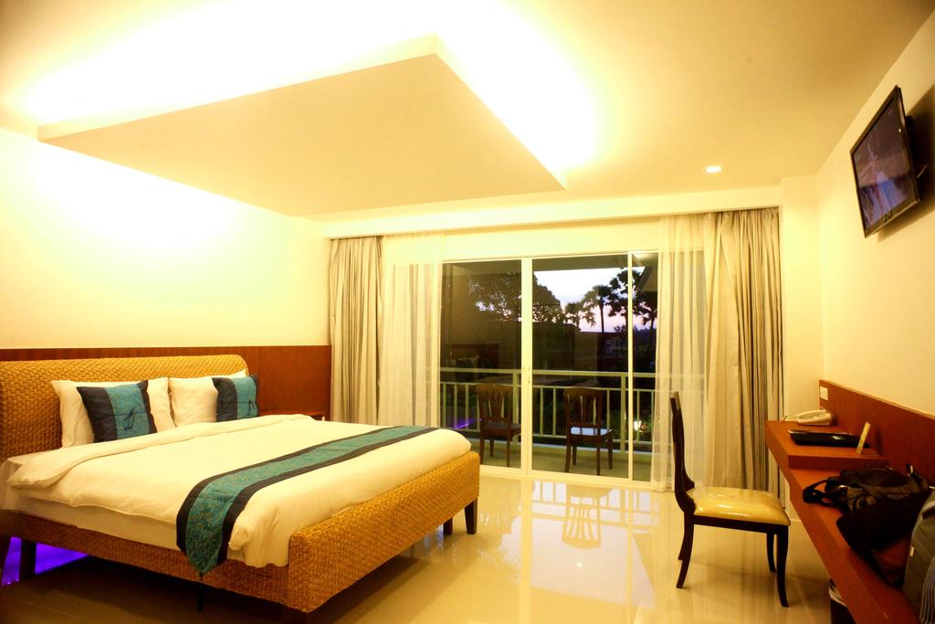 Отдых в отеле Chanalai Flora Resort