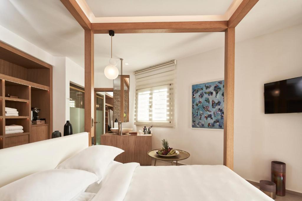 Фото готелю Myconian Naia Luxury Suites