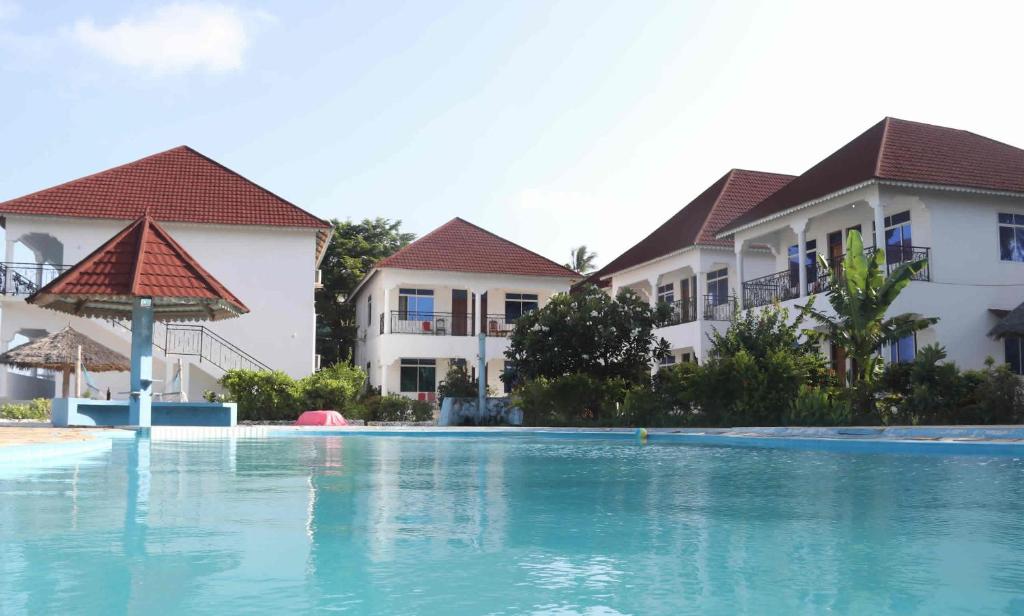 Горящие туры в отель Visitors Inn Джамбиани