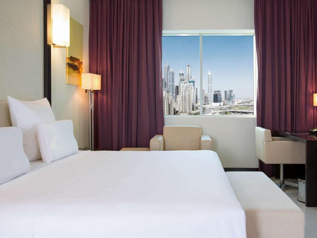 Відпочинок в готелі Pullman Dubai Jumeirah Lakes Towers Дубай (пляжні готелі)