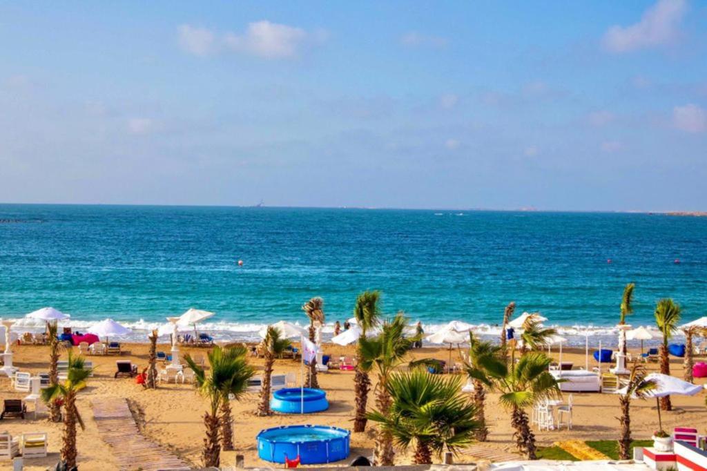Paradise Inn Maamura Beach Resort, Александрія