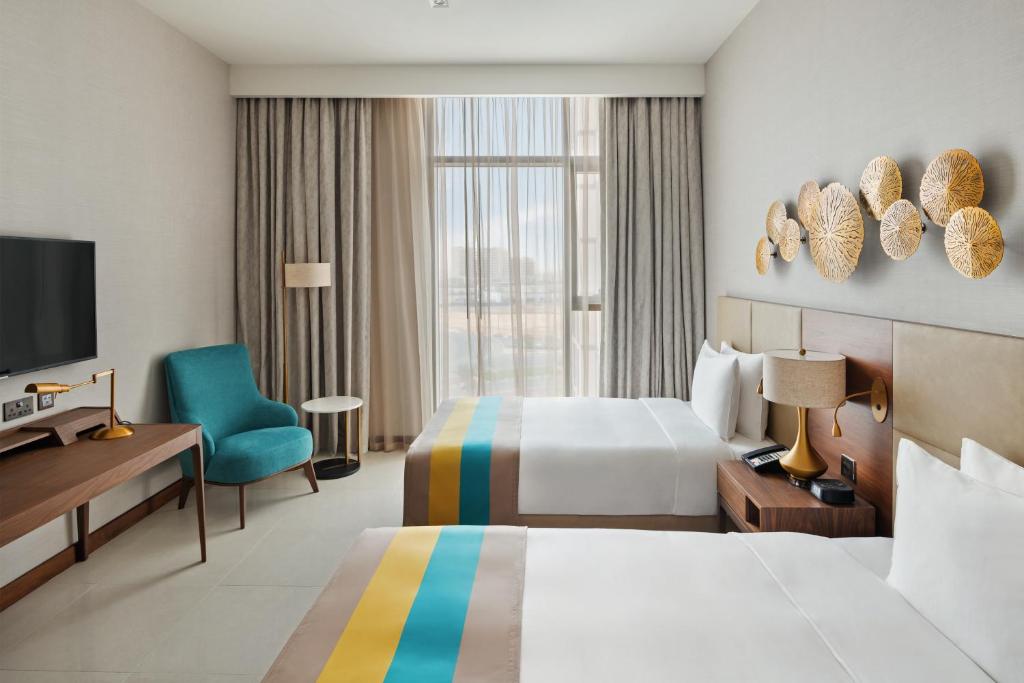 Holiday Inn Dubai al-Maktoum Airport фото и отзывы
