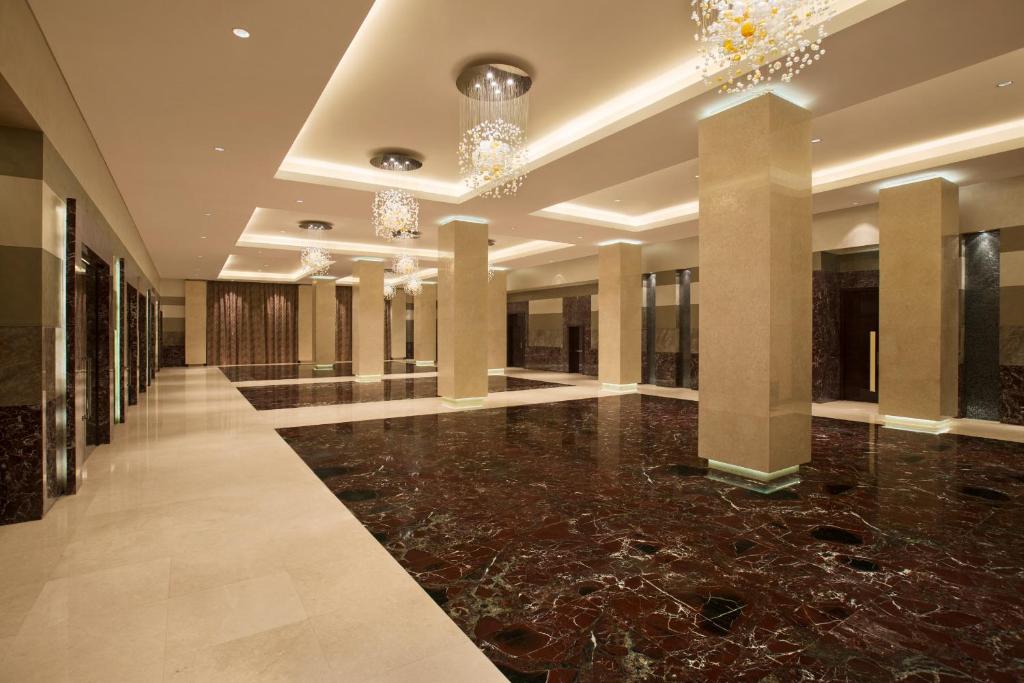 Фото отеля Millennium Al Rawdah Hotel (ex. Hilton Capital Grand)