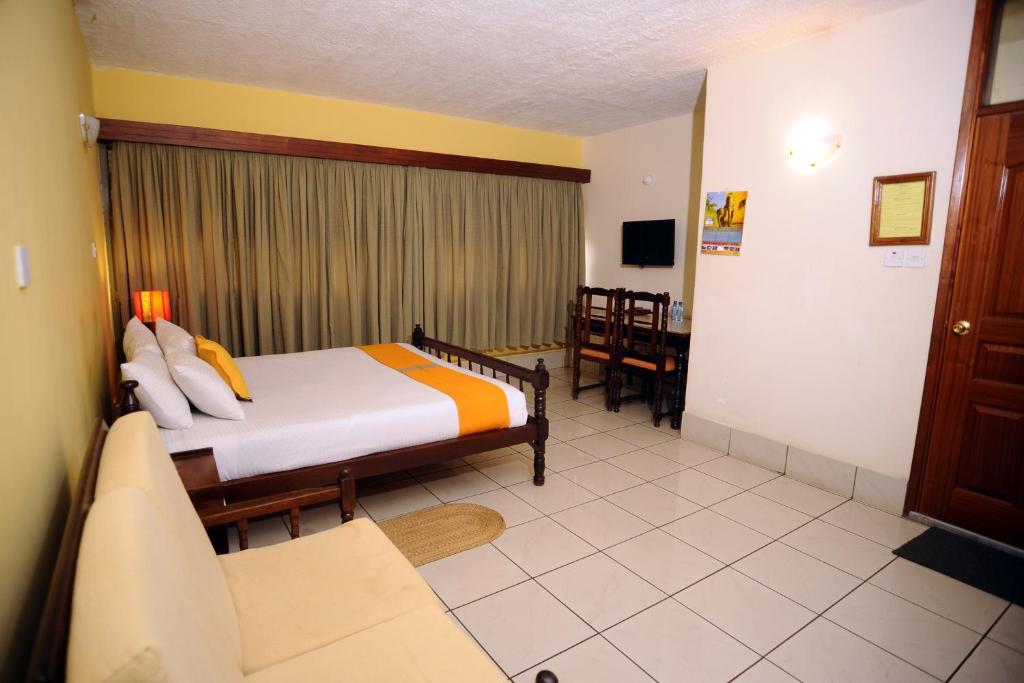 Фото отеля Kenya Comfort Hotel Suites