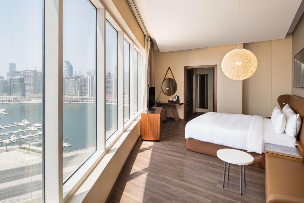 Дубай (город) Radisson Blu Hotel, Dubai Canal View цены
