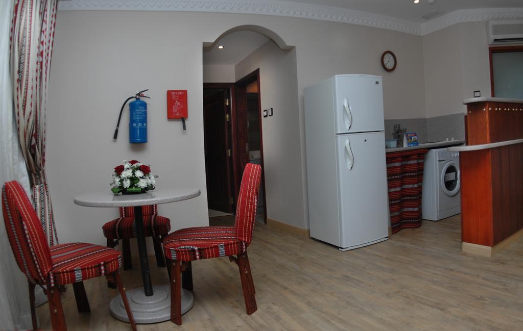 Al Liwan Suites Doha, фото