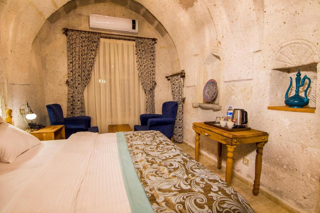 Caldera Cave Hotel Турция цены