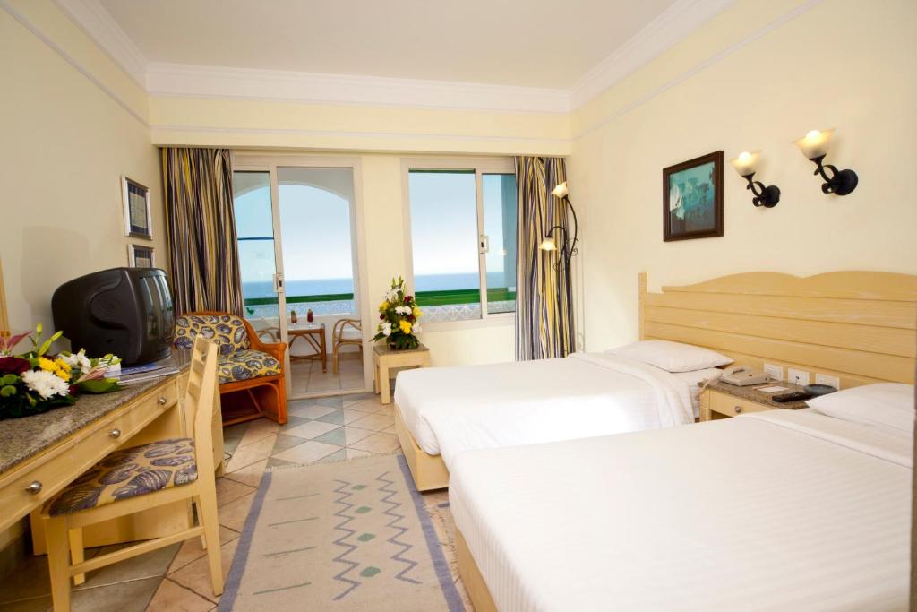 Coral Beach Resort Tiran цена