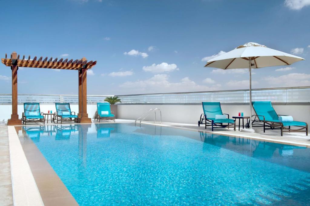 Hilton Garden Inn Dubai Al Muraqabat, 4, фотографии