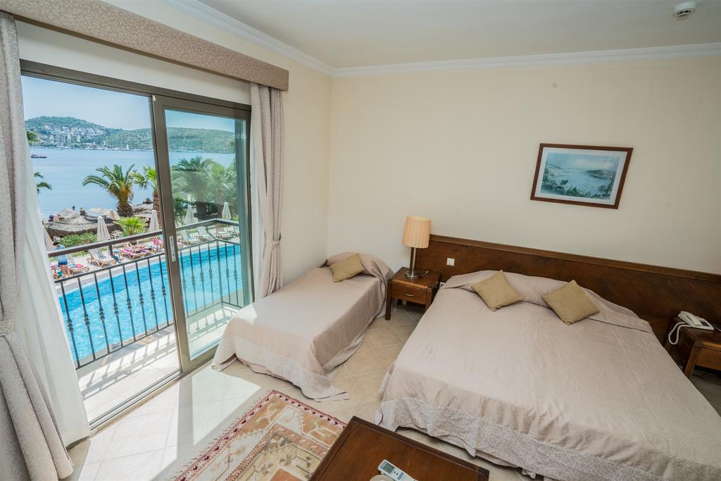 Відпочинок в готелі Costa 3s Beach Hotel Бодрум