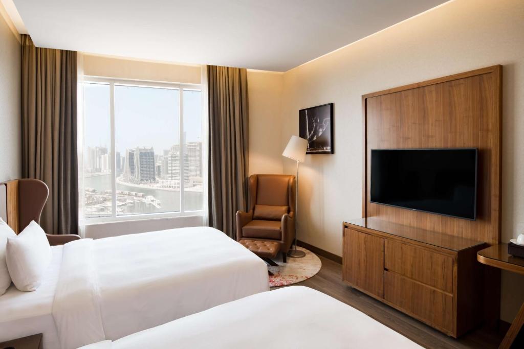 Отдых в отеле Radisson Blu Hotel, Dubai Canal View