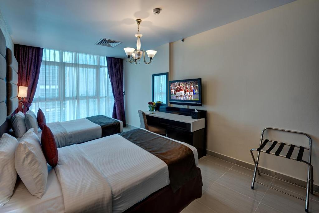 Emirates Grand Hotel Apartments ціна